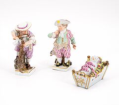 Meissen - Kinderfigur mit Hund Kinderfigur eines Holzfaellers und eine Wiege mit Saeugling, 76846-16, Van Ham Kunstauktionen